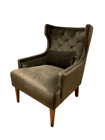 velvet rich green armchair with a green velvet pillow